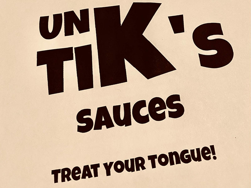 unk tiks logo